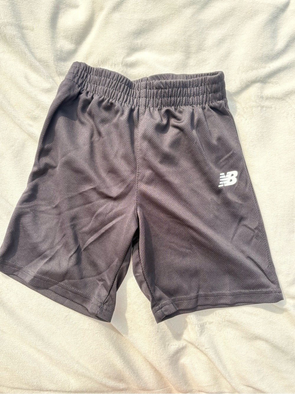 New Balance Boys size 7 Charcoal Athletic Shorts with White Logo